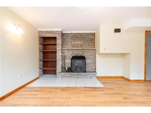 Bsmt-638 Carlton Street, St. Catharines, ON - Indoor Photo Showing Living Room With Fireplace