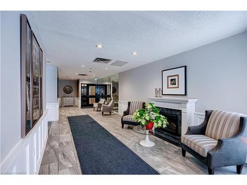 1206-20 Mcfarlane Drive, Georgetown, ON - Indoor With Fireplace