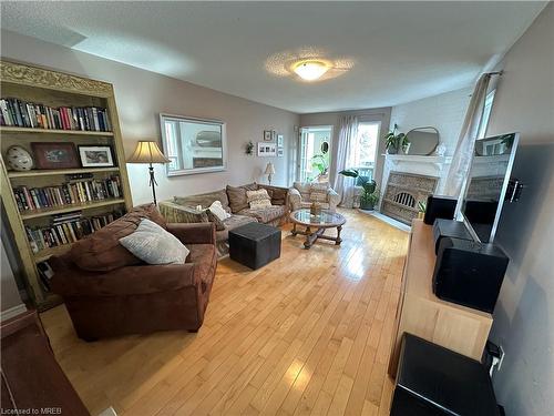 28 Huntingwood Avenue, Hamilton, ON - Indoor Photo Showing Living Room With Fireplace