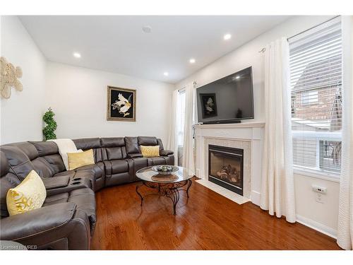 1051 Ferguson Drive, Milton, ON - Indoor Photo Showing Living Room With Fireplace