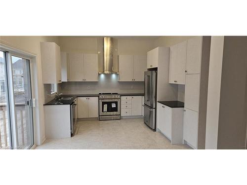 3936 Leonardo Street, Burlington, ON - Indoor Photo Showing Kitchen With Stainless Steel Kitchen With Double Sink