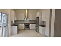 3936 Leonardo Street, Burlington, ON  - Indoor Photo Showing Kitchen With Stainless Steel Kitchen With Double Sink 