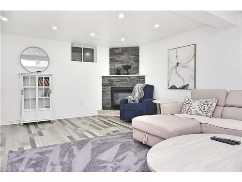 660 Zermatt Drive, Waterloo, ON - Indoor Photo Showing Living Room With Fireplace