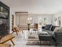 613 Long Lake Road, Novar, ON  - Indoor Photo Showing Living Room With Fireplace 