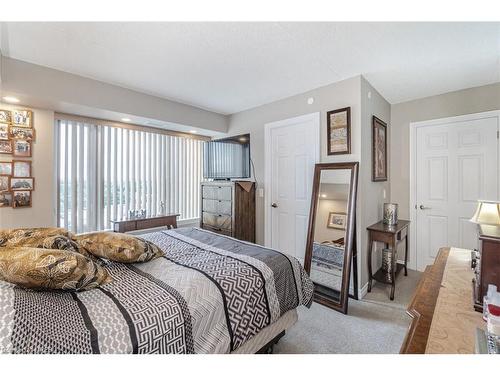 911-716 Main Street E, Milton, ON - Indoor Photo Showing Bedroom