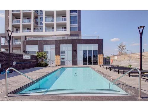 1112-1050 Main Street East, Halton, ON - Outdoor With In Ground Pool With Balcony