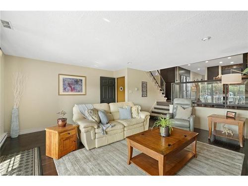 W-9-1500 Venetian Boulevard, Point Edward, ON - Indoor Photo Showing Living Room