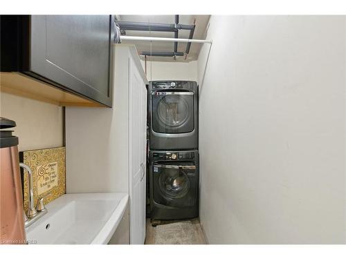 W-9-1500 Venetian Boulevard, Point Edward, ON - Indoor Photo Showing Laundry Room