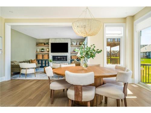 101 Stoneleigh Drive, The Blue Mountains, ON - Indoor Photo Showing Dining Room With Fireplace