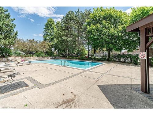 210-10 Malta Avenue, Brampton, ON - Outdoor With In Ground Pool