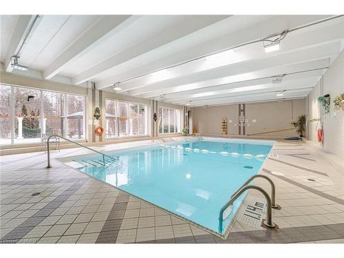 Ph1-3695 Kaneff Crescent, Mississauga, ON - Indoor Photo Showing Other Room With In Ground Pool
