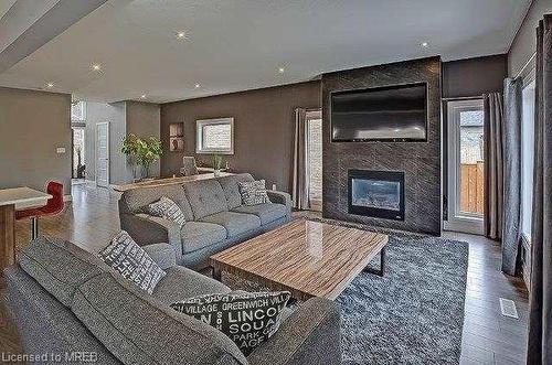 3335 Singleton Avenue, London, ON - Indoor Photo Showing Living Room With Fireplace