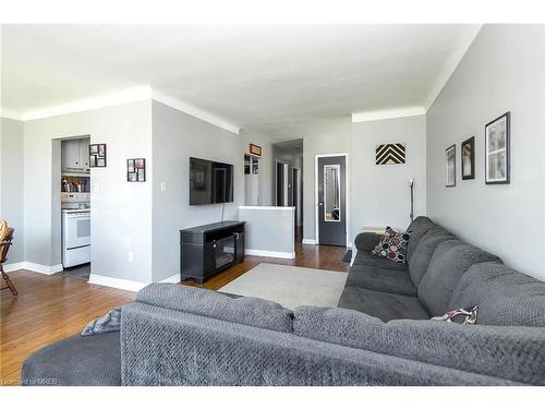 6861 Hagar Avenue, Niagara Falls, ON - Indoor Photo Showing Living Room With Fireplace