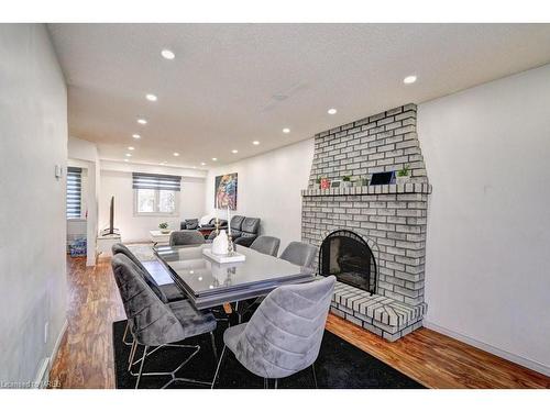 30 Maxwell Drive, Kitchener, ON - Indoor Photo Showing Dining Room With Fireplace