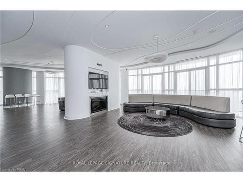 1002-60 Absolute Avenue, Mississauga, ON - Indoor With Fireplace