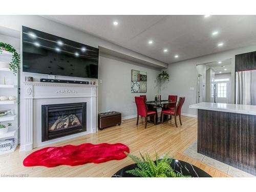 785 Megson Terrace, Milton, ON - Indoor Photo Showing Living Room With Fireplace