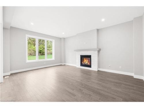 117 Birdie Court, Woodstock, ON - Indoor Photo Showing Living Room With Fireplace