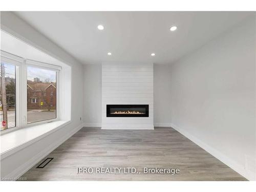 2-5 Maplewood Avenue, Hamilton, ON - Indoor With Fireplace