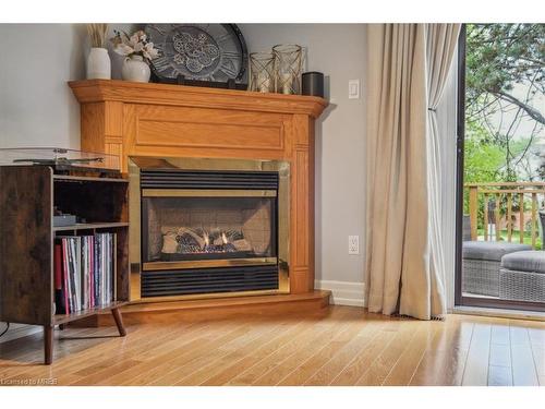 59-1080 Walden Circle, Mississauga, ON - Indoor Photo Showing Living Room With Fireplace