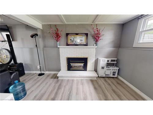 82 Moore Avenue, Aylmer, ON - Indoor Photo Showing Living Room With Fireplace