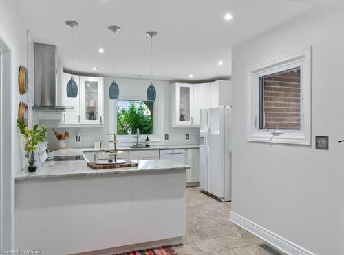 963 St Mary'S Boulevard, Windsor, ON - Indoor Photo Showing Kitchen With Double Sink