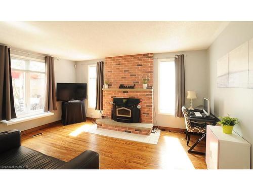 156 Bexhill Close, London, ON - Indoor Photo Showing Living Room With Fireplace