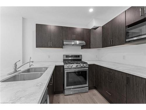 494 Lampman Place Place, Woodstock, ON - Indoor Photo Showing Kitchen With Double Sink