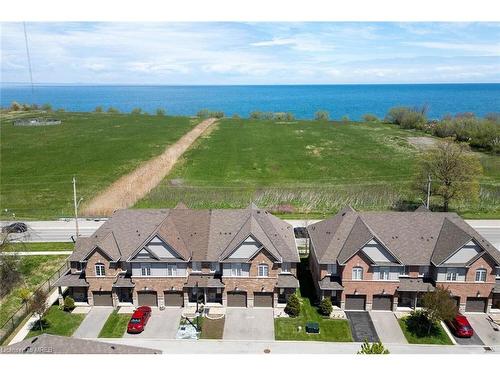 68-515 Winston Road S, Grimsby, ON - Outdoor With Body Of Water With Facade With View