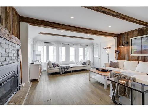 16 William Avenue, Wasaga Beach, ON - Indoor Photo Showing Living Room With Fireplace