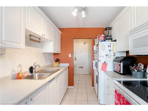 505-2411 New Street, Burlington, ON - Indoor Photo Showing Kitchen With Double Sink