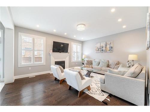 1190 Mceachern Court, Milton, ON - Indoor Photo Showing Living Room With Fireplace