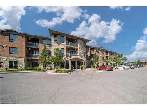 204-740 Augusta Drive, Kingston, ON - Outdoor With Balcony With Facade