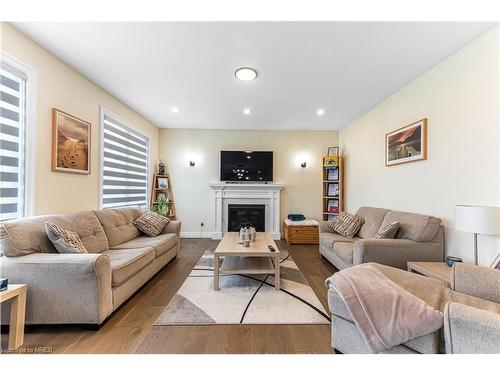 82 Optimist Drive, Talbotville, ON - Indoor Photo Showing Living Room With Fireplace