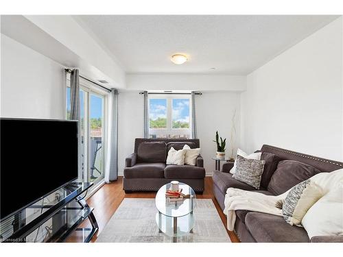 203-1005 Nadalin Heights, Milton, ON - Indoor Photo Showing Living Room