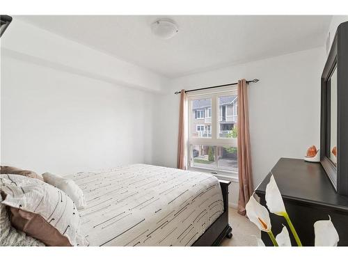 203-1005 Nadalin Heights, Milton, ON - Indoor Photo Showing Bedroom