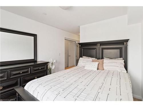 203-1005 Nadalin Heights, Milton, ON - Indoor Photo Showing Bedroom