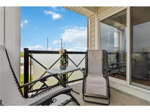 203-1005 Nadalin Heights, Milton, ON - Outdoor With Balcony With Exterior