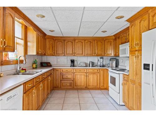 3670-3Rd Concession Road, Essex, ON - Indoor Photo Showing Kitchen With Double Sink