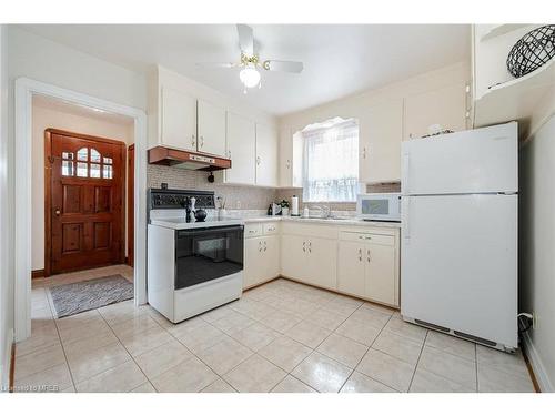 76 Cannon Road, Toronto, ON - Indoor Photo Showing Kitchen With Double Sink