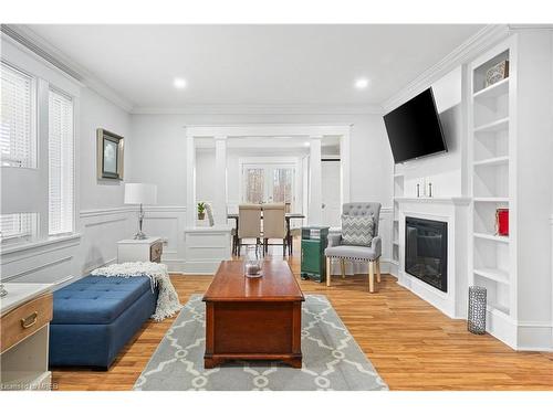 5835 Brookfield Avenue, Niagara Falls, ON - Indoor Photo Showing Living Room With Fireplace