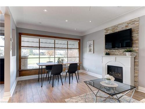 57 Berry Avenue, Hamilton, ON - Indoor With Fireplace