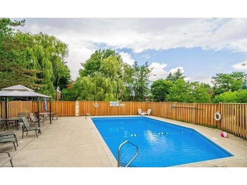 6-460 Beechwood Place, Waterloo, ON - Outdoor With In Ground Pool With Backyard