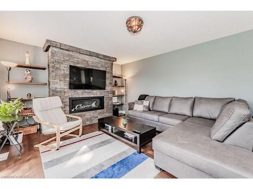 100 Acorn Way, Cambridge, ON - Indoor Photo Showing Living Room With Fireplace