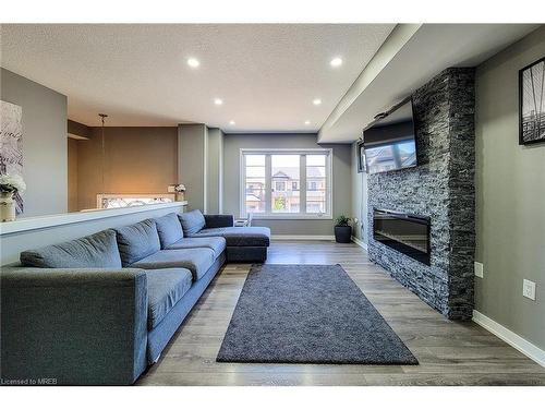 52 Crafter Crescent, Stoney Creek, ON - Indoor Photo Showing Living Room With Fireplace