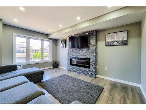 52 Crafter Crescent, Stoney Creek, ON - Indoor Photo Showing Living Room With Fireplace