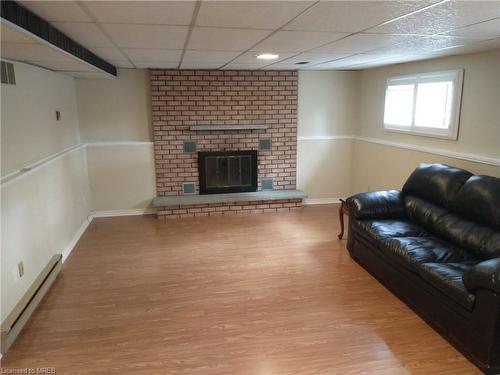 7 Canora Court, Welland, ON - Indoor Photo Showing Other Room With Fireplace