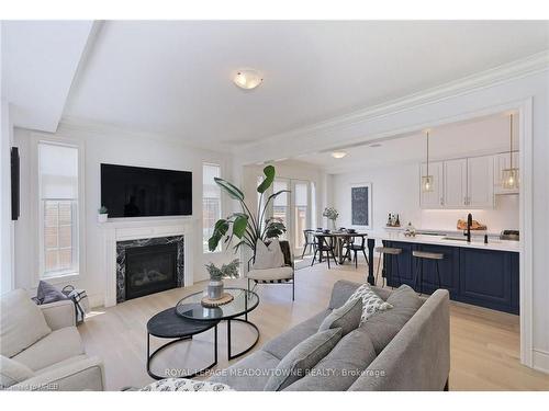 125 Burnhamthorpe Road E, Oakville, ON - Indoor Photo Showing Living Room With Fireplace