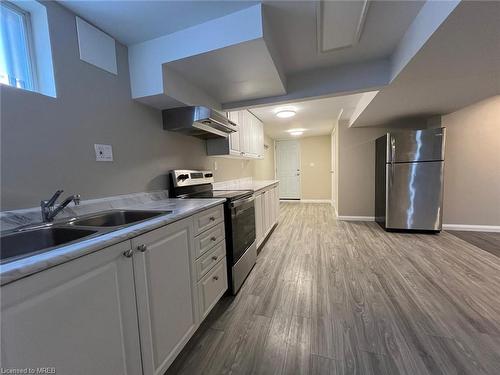 Bsmt-75 Keewatin Street, Oshawa, ON - Indoor Photo Showing Kitchen With Double Sink