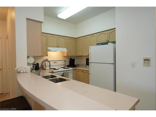 101-2565 Erin Centre Boulevard, Mississauga, ON - Indoor Photo Showing Kitchen With Double Sink