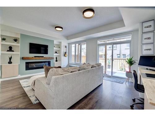 212 Wheat Boom Drive, Oakville, ON - Indoor Photo Showing Living Room With Fireplace